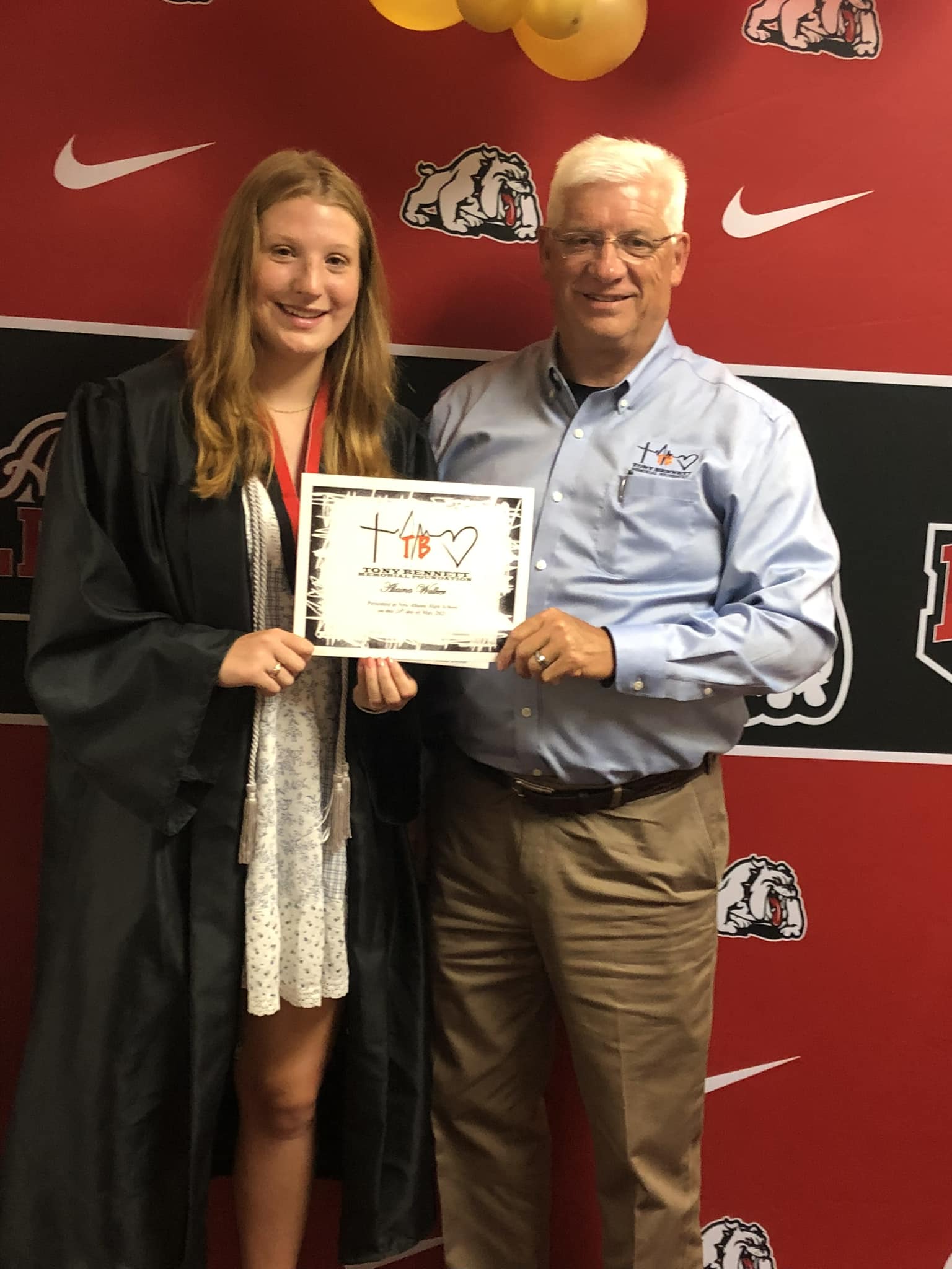 New Albany student accepting scholarship.